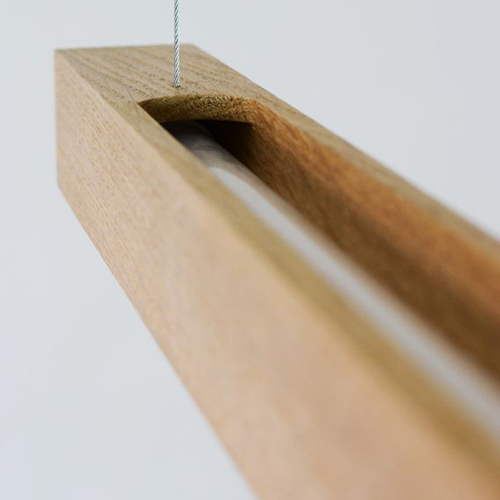 a dainty wooden pendant light